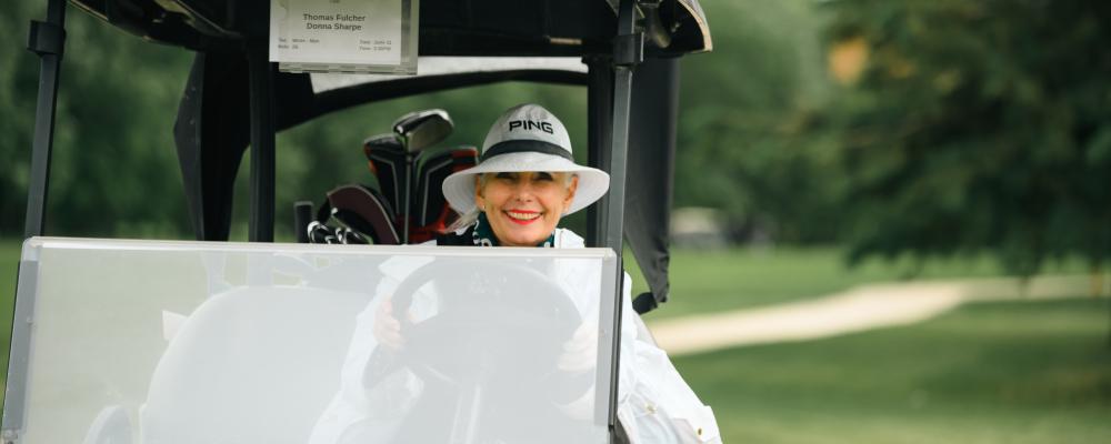 Picture of Donna in Golf Cart