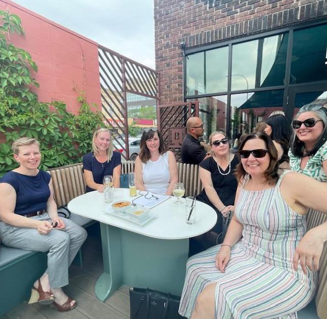 PIDIM members sitting at table picture